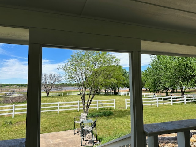 doorway to outside with a rural view