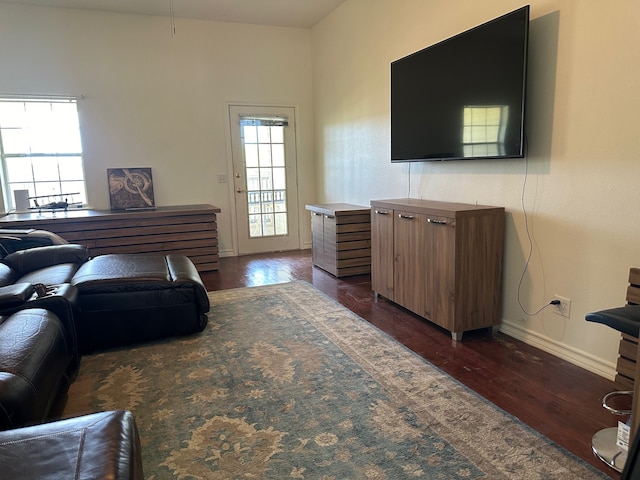 living room featuring dark hardwood / wood-style floors