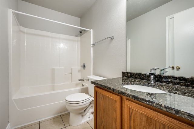 full bathroom featuring vanity, toilet, tile patterned floors, and bathtub / shower combination