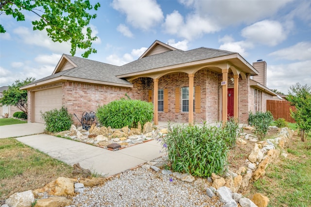 view of front of property with a garage