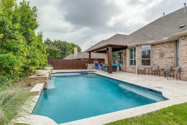 view of pool with a fenced in pool, a patio area, fence, and outdoor lounge area