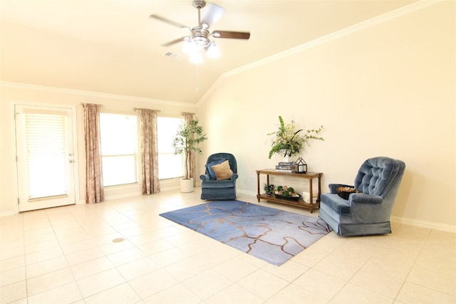 sitting room with ornamental molding, lofted ceiling, ceiling fan, and light tile flooring