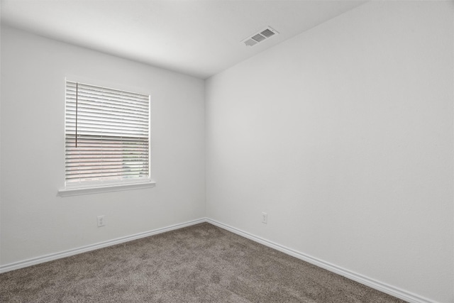 unfurnished room with carpet