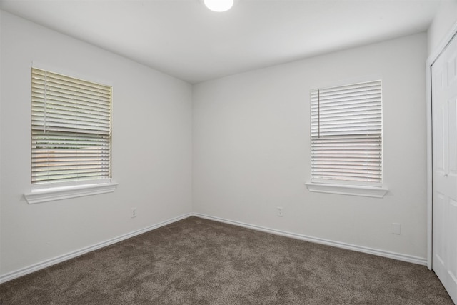 view of carpeted spare room