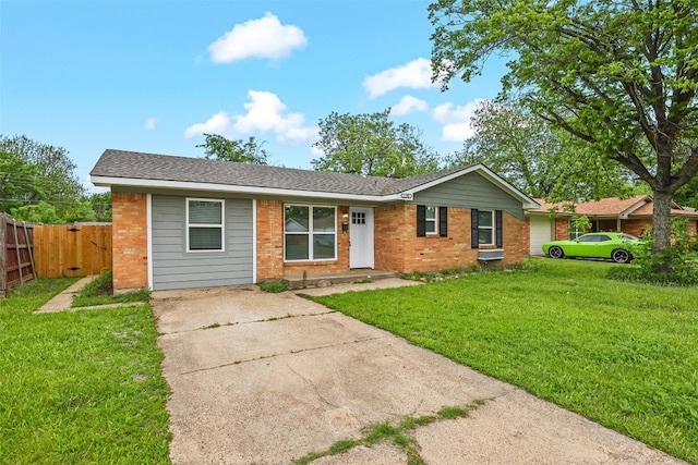 ranch-style house with a front lawn