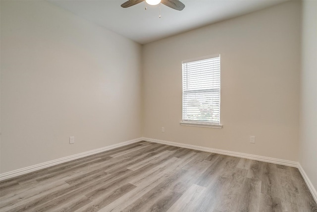 unfurnished room featuring hardwood / wood-style floors and ceiling fan