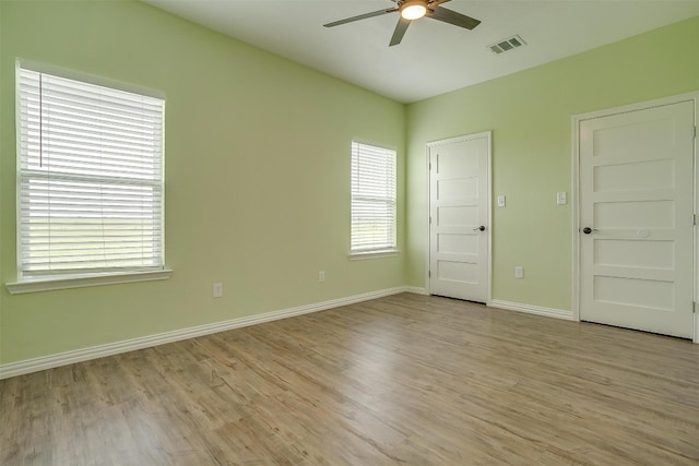 unfurnished bedroom with light hardwood / wood-style flooring and ceiling fan