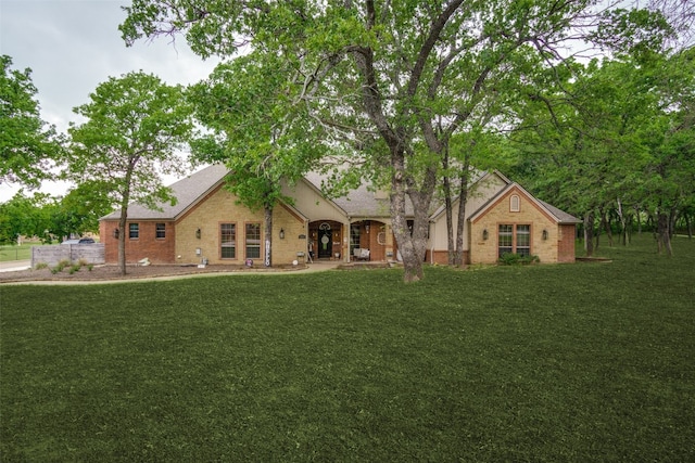 view of front facade with a front yard