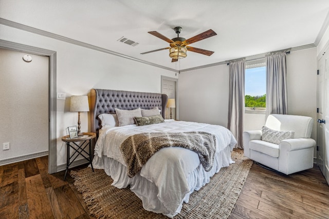 bedroom with ceiling fan, crown molding, and dark hardwood / wood-style floors