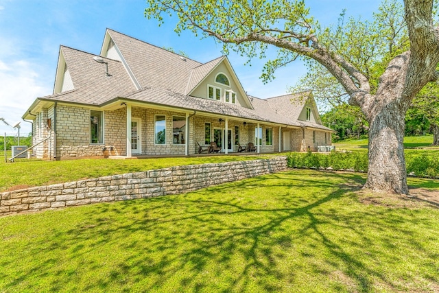 farmhouse inspired home with a front yard