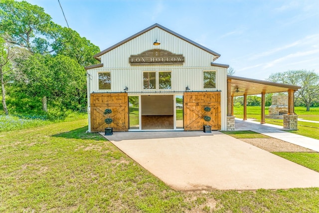 exterior space with a yard and a carport