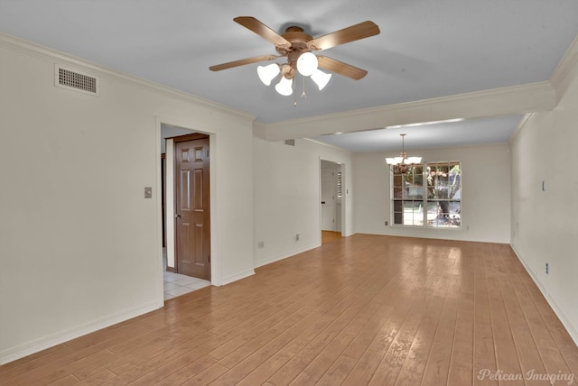 spare room featuring ceiling fan with notable chandelier, light hardwood / wood-style floors, and ornamental molding