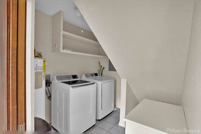 washroom with washing machine and dryer and light tile patterned floors