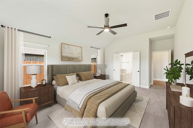 carpeted bedroom with lofted ceiling, ensuite bathroom, and ceiling fan