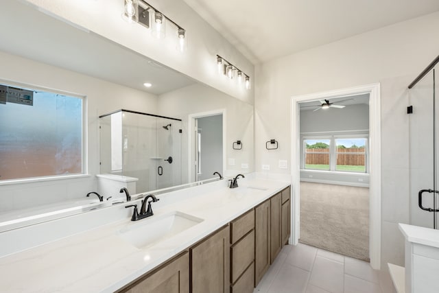 bathroom with vanity, ceiling fan, separate shower and tub, and tile patterned flooring