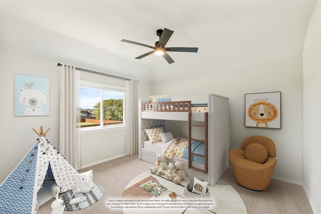 carpeted bedroom featuring ceiling fan