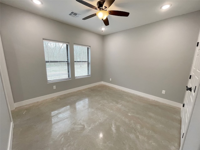 spare room with ceiling fan