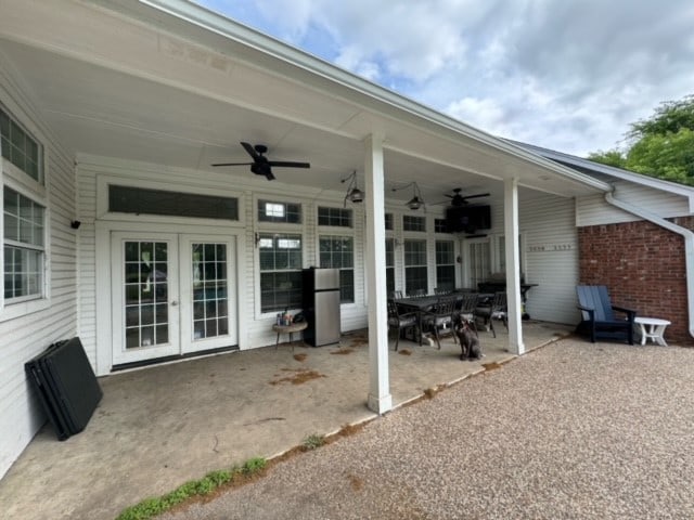 view of patio / terrace featuring ceiling fan