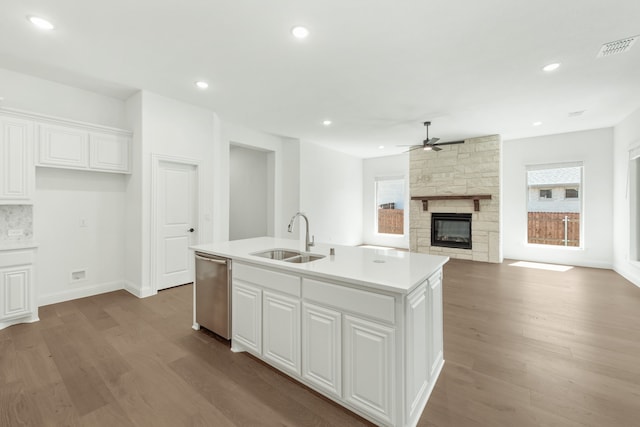 interior space with lofted ceiling, ceiling fan, and light carpet