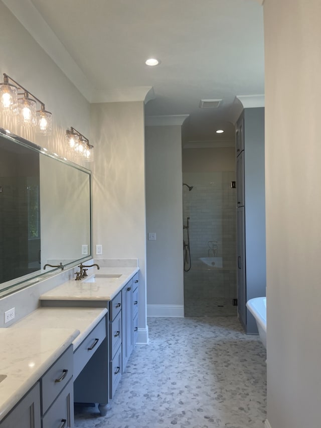 bathroom with crown molding, baseboards, a stall shower, a soaking tub, and vanity