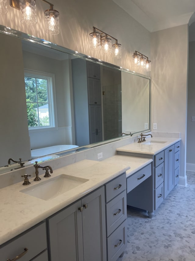 full bath featuring a washtub and vanity