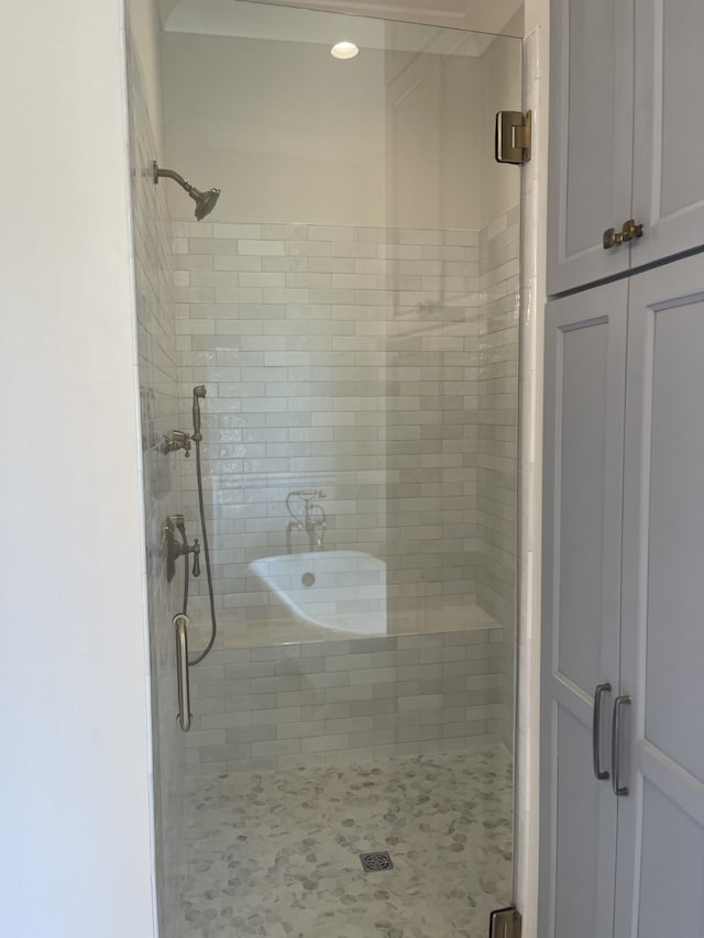 bathroom with a stall shower