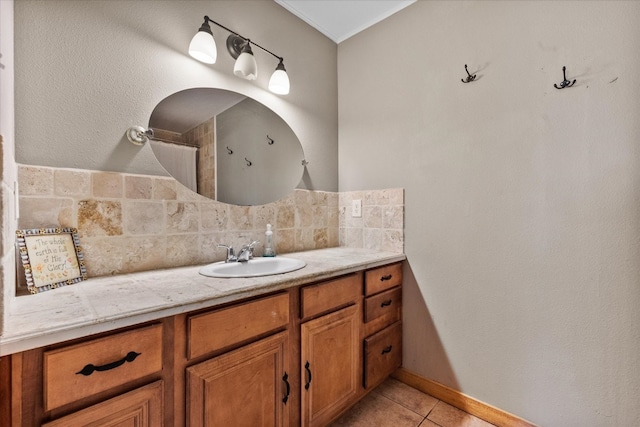 bathroom featuring tasteful backsplash, tile flooring, and vanity