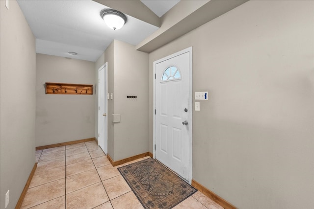 foyer featuring light tile flooring