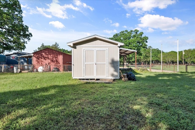 view of outdoor structure with a lawn