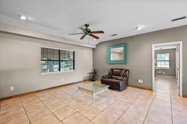 interior space featuring ceiling fan