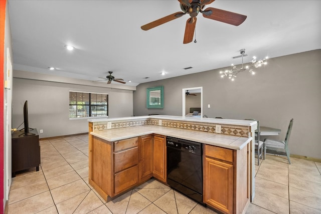 kitchen with black dishwasher, ceiling fan with notable chandelier, and light tile floors