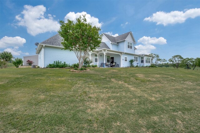 exterior space featuring a front lawn