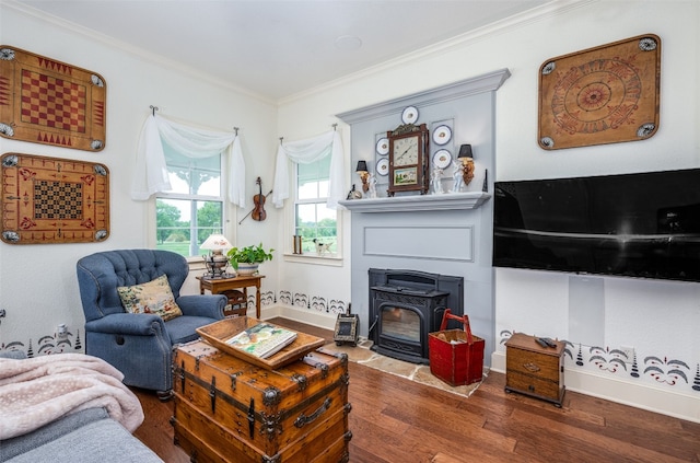 living room featuring a wood stove, dark hardwood / wood-style flooring, and ornamental molding