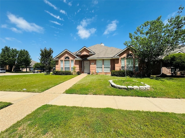 view of front of home with a front yard