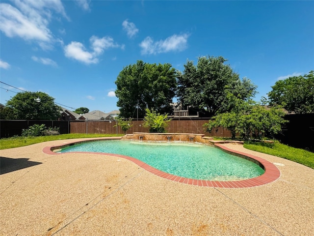 view of pool featuring a patio