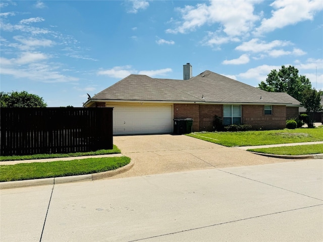 ranch-style house with a front lawn and a garage