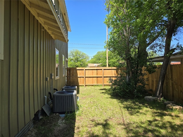 view of yard with central AC