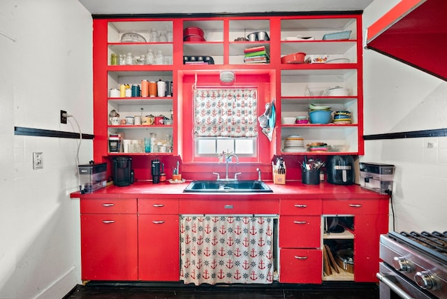 kitchen featuring sink and range