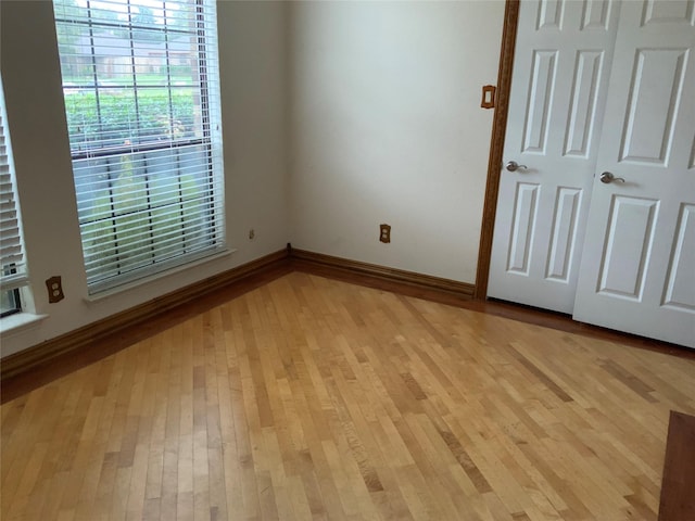 empty room featuring light wood-type flooring