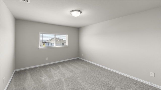 empty room with carpet floors