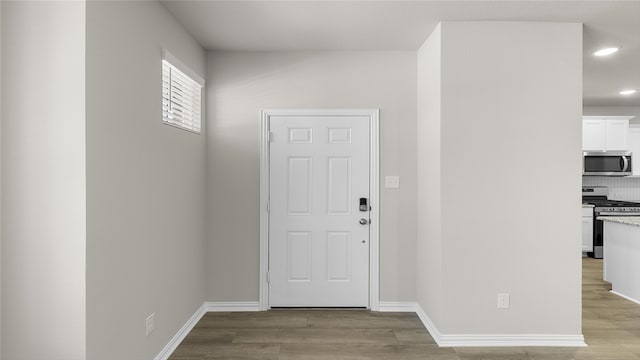 entrance foyer with light wood-type flooring