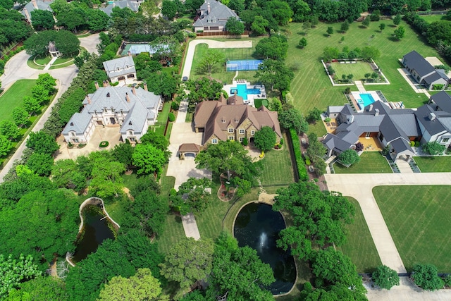 bird's eye view with a water view