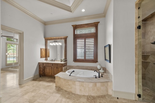 bathroom featuring crown molding, vanity, and independent shower and bath