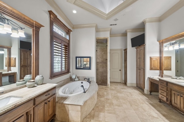 bathroom with vanity, a tray ceiling, independent shower and bath, and crown molding