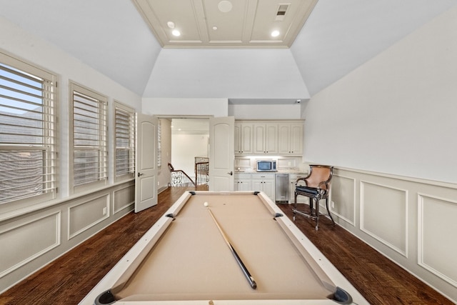 rec room featuring dark hardwood / wood-style flooring, vaulted ceiling, and billiards