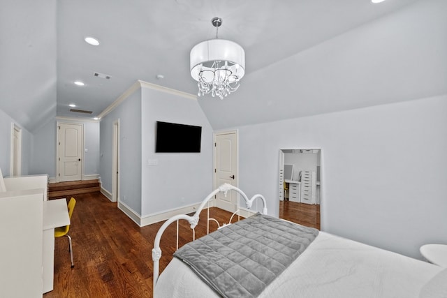 bedroom with crown molding, dark hardwood / wood-style floors, lofted ceiling, and a notable chandelier