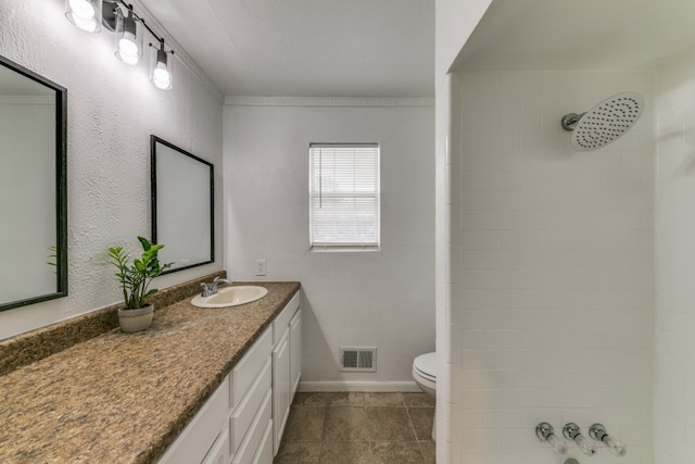 bathroom with tile patterned floors, toilet, and vanity