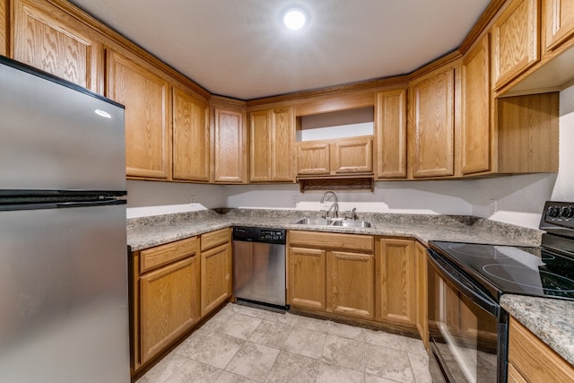 kitchen featuring light tile patterned floors, appliances with stainless steel finishes, sink, and light stone counters