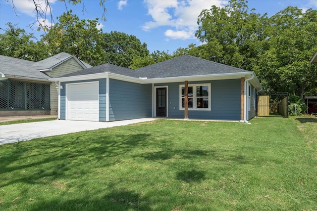 ranch-style home featuring a garage and a front yard