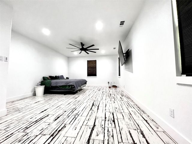 interior space featuring ceiling fan and light hardwood / wood-style flooring